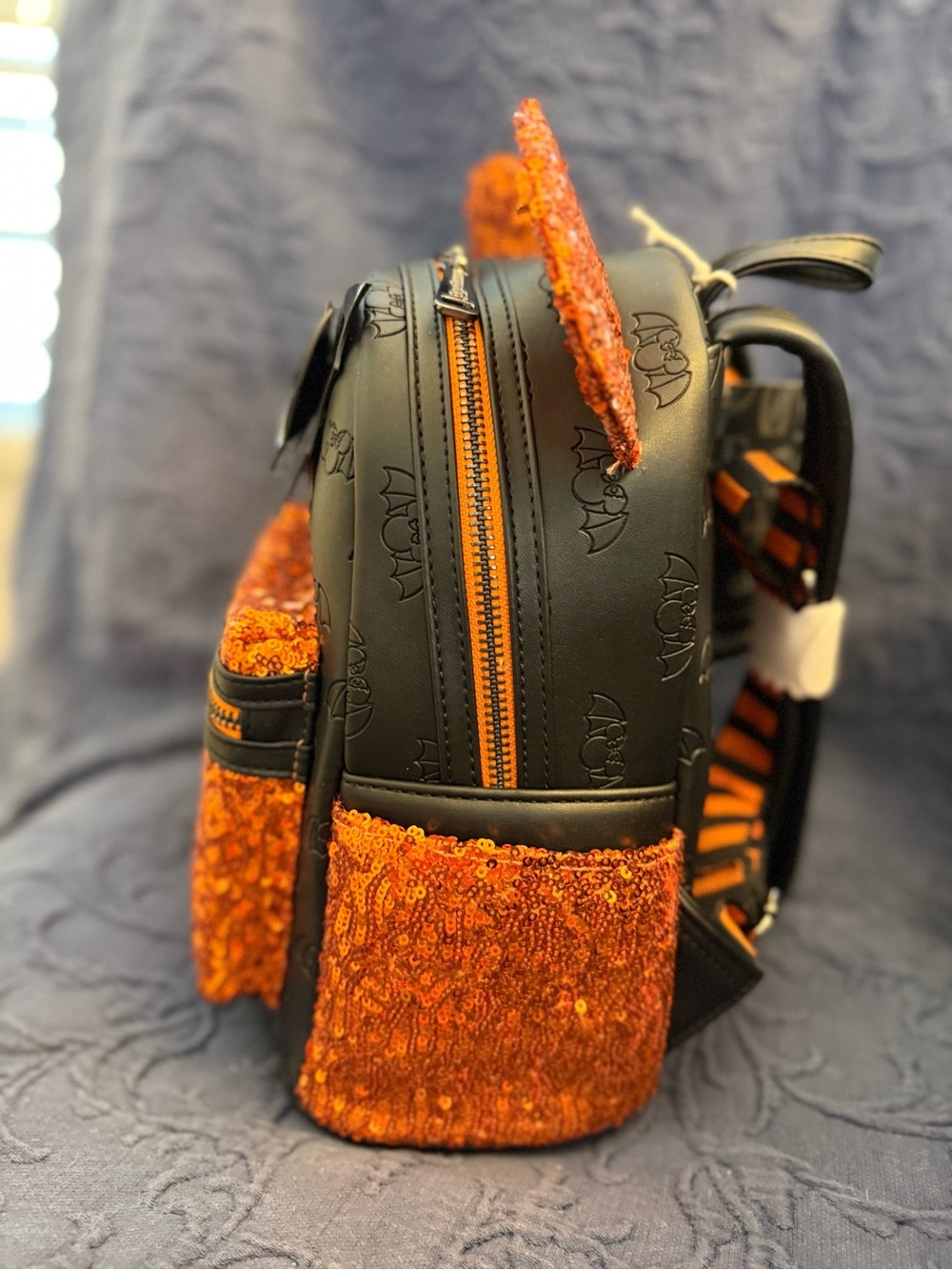 LOUNGEFLY Disney Orange Sequin Minnie Ear Backpack with Black Bow - Picture 3 of 6